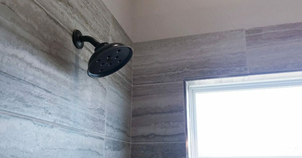 rain shower head distance from wall